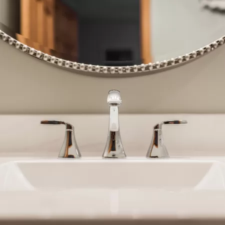 close up of faucet and sink in bathroom remodel