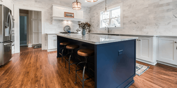 new kitchen island with bold blue cabinets