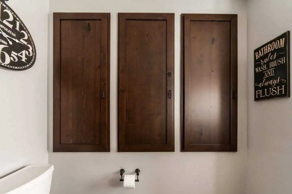 Brown bathroom remodel in Steward IL storage cabinets