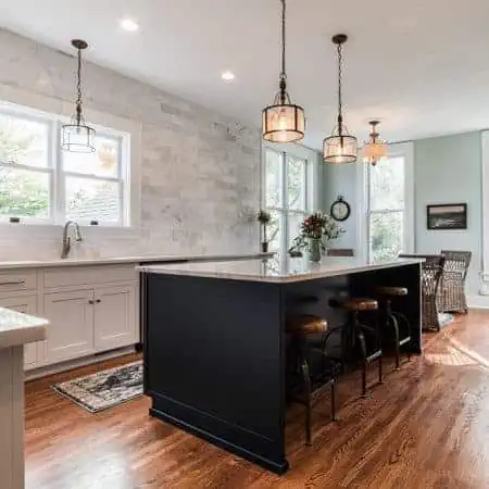 White kitchen remodel with blue kitchen island