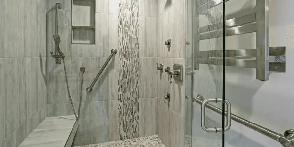 ada bathroom remodel and shower with safety bars 