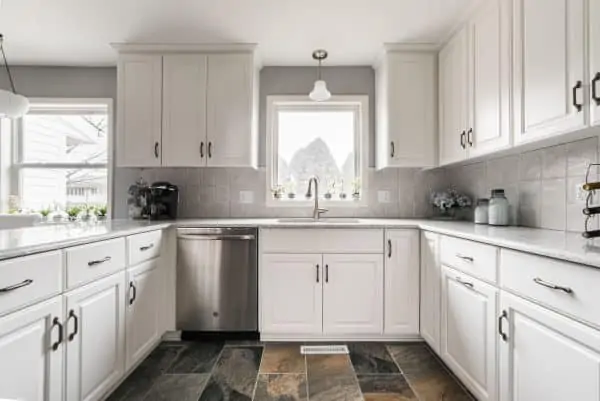 dekalb kitchen remodel stone floor white cabinets
