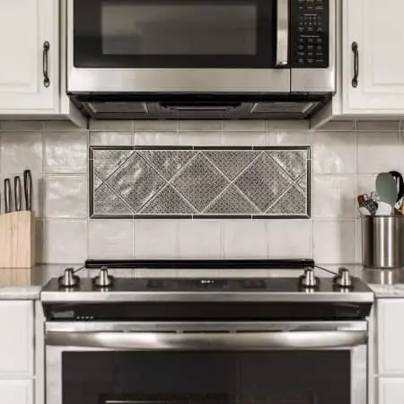 kitchen remodel stove white cabinets