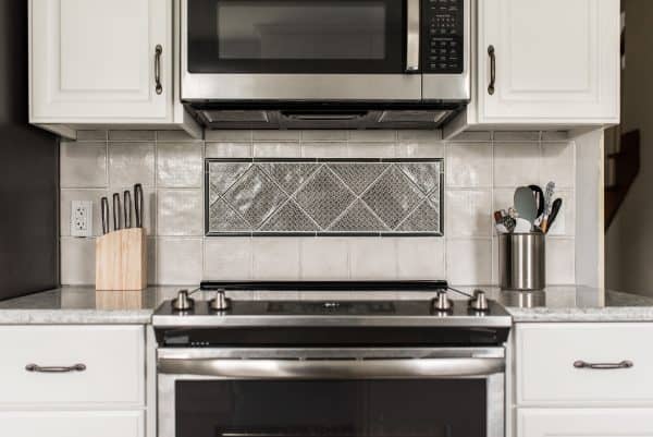kitchen remodel stove white cabinets