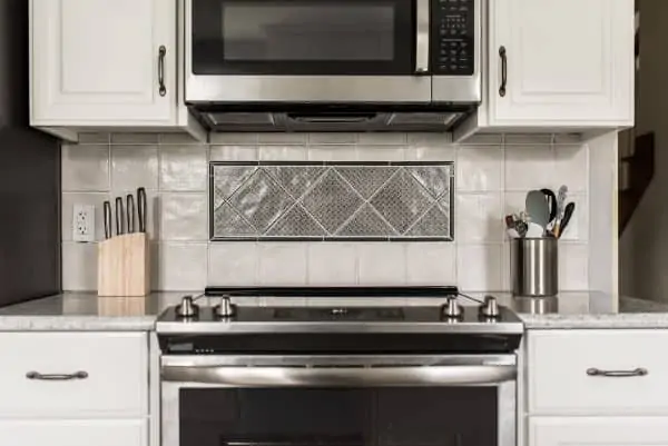 kitchen remodel stove white cabinets