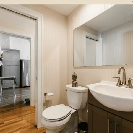 Sycamore Bathroom Remodel With Dark Cabinets