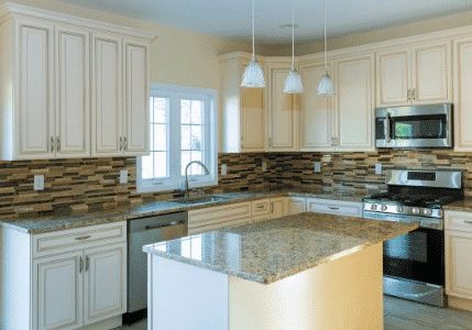 brand new white kitchen with granite island